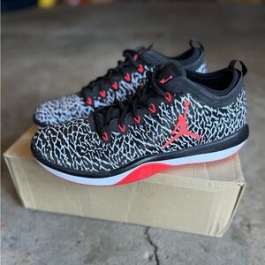 Nike Black and White Elephant Print Low-Top Sneakers with Red Accents
